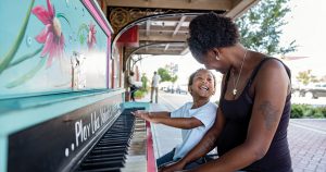 Mother and son playing piano in Goldsboro North Carolina