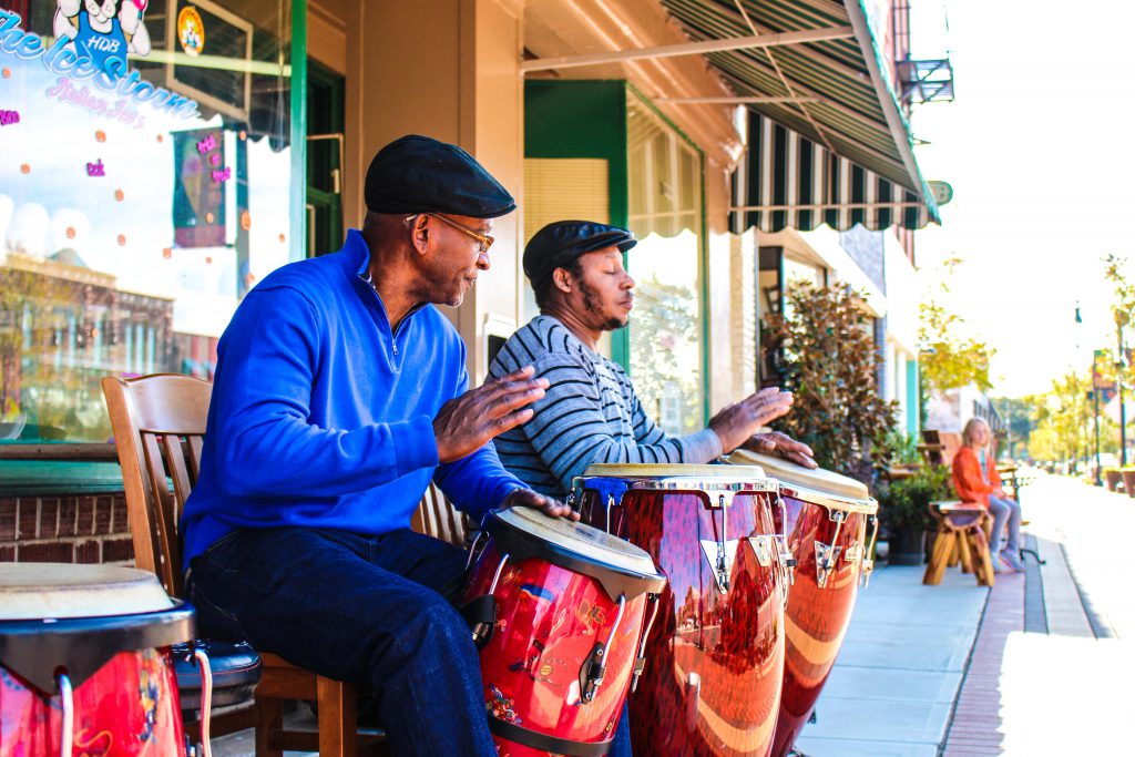 Two guys playing bongos in downtown Goldsboro North Carolina
