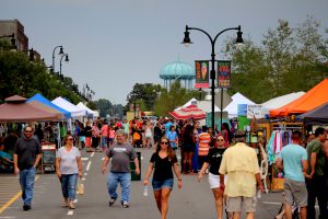Group of people walking in downtown Goldsboro North Carolina for North Carolina Poultry Fest