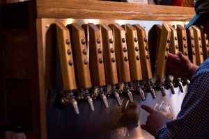 Man pouring beer at Goldsboro North Carolina's Brew Works